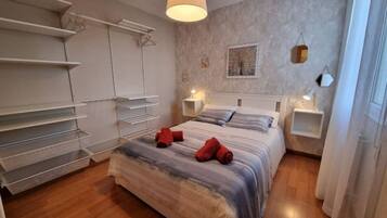 2 dormitorios, tabla de planchar con plancha, wifi gratis y ropa de cama