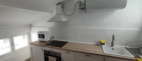 Fridge, microwave, oven, cookware/dishes/utensils