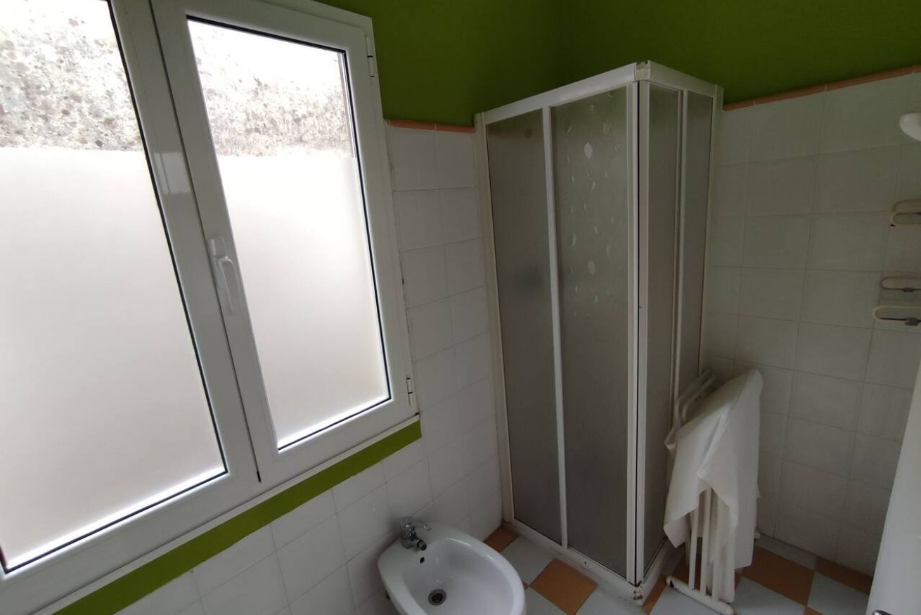 Ducha, secador de pelo y toallas