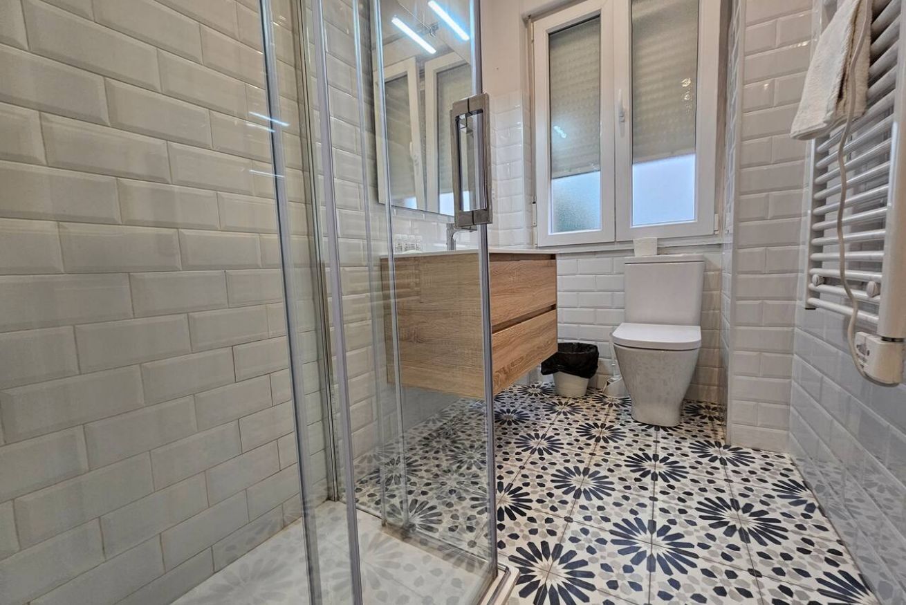 Doccia, asciugamani, shampoo