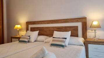 2 dormitorios, tabla de planchar con plancha, wifi gratis y ropa de cama