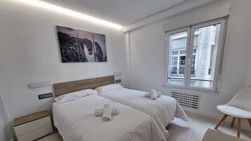 4 dormitorios, tabla de planchar con plancha, wifi gratis y ropa de cama