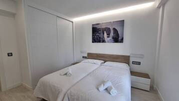 4 slaapkamers, een strijkplank/strijkijzer, gratis wifi, beddengoed