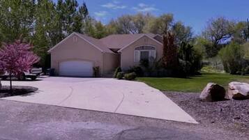 Wide driveway with room for several cars