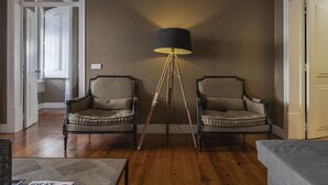 A room with two armchairs, a floor lamp, and a sofa. - Central São Paulo by Lisbon Heart (Lisboa)