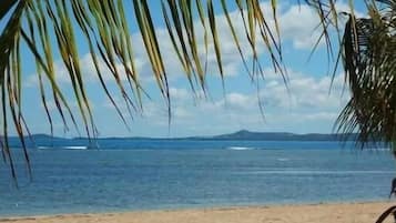 On the beach, sun-loungers, beach towels