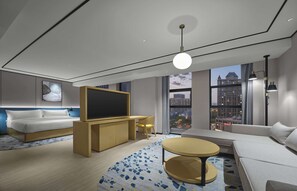 Family Room, 1 King Bed | Living area | 55-inch flat-screen TV with cable channels, TV