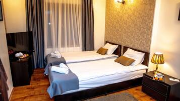 City driepersoonskamer | 2 slaapkamers, een minibar, geluiddichte muren, gratis wifi