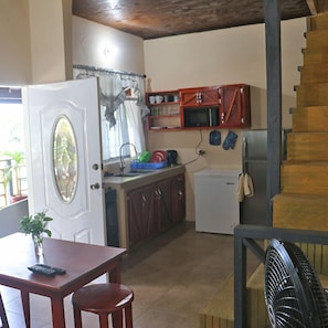 Comfort Apartment, Partial Ocean View | Private kitchen | Full-size fridge, microwave, oven, toaster