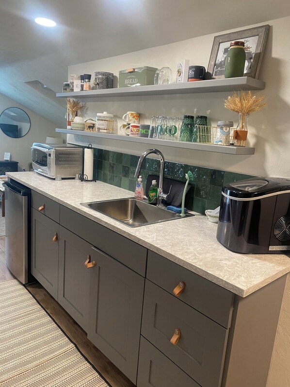 Fridge, microwave, coffee/tea maker, toaster