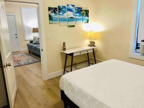 1 bedroom, desk, iron/ironing board, travel cot