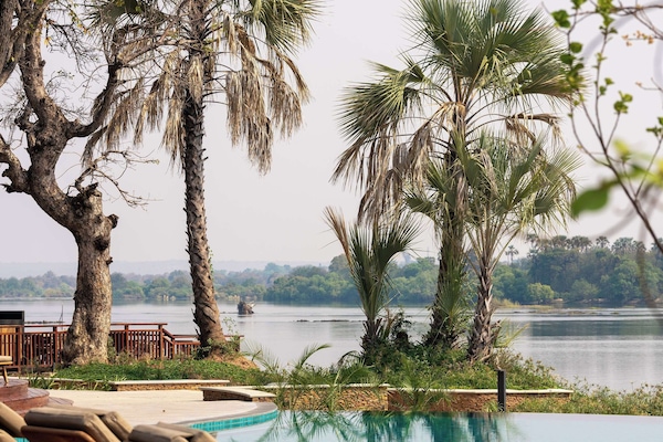 2 outdoor pools, open 8:00 AM to 9:00 PM, free cabanas, pool umbrellas