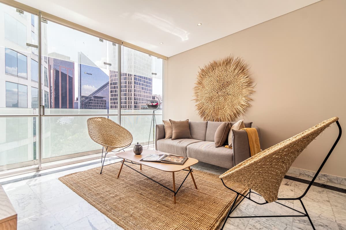 Comfort Apartment | Living area | 50-inch LED TV with cable channels, TV