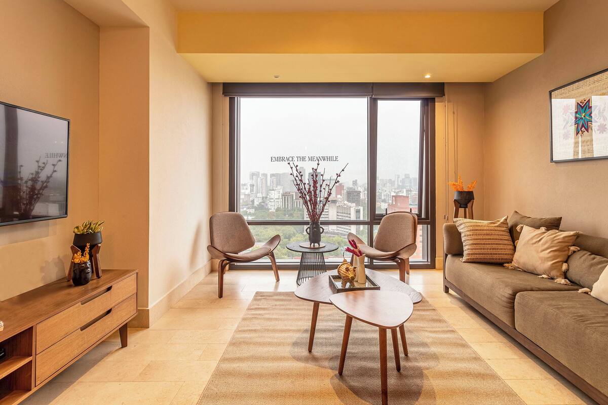 Deluxe Apartment | Living area | 50-inch LED TV with cable channels, TV
