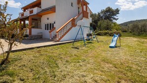 Children’s area - Apartments Torina - One Bedroom Apartment with Balcony and Sea View (Pasman)