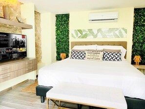 Tabla de planchar con plancha, wifi gratis y ropa de cama 