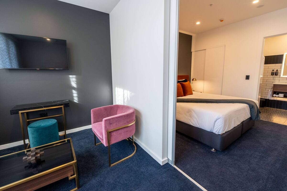 Premium Suite, 1 Bedroom | Desk, laptop workspace, blackout drapes, soundproofing