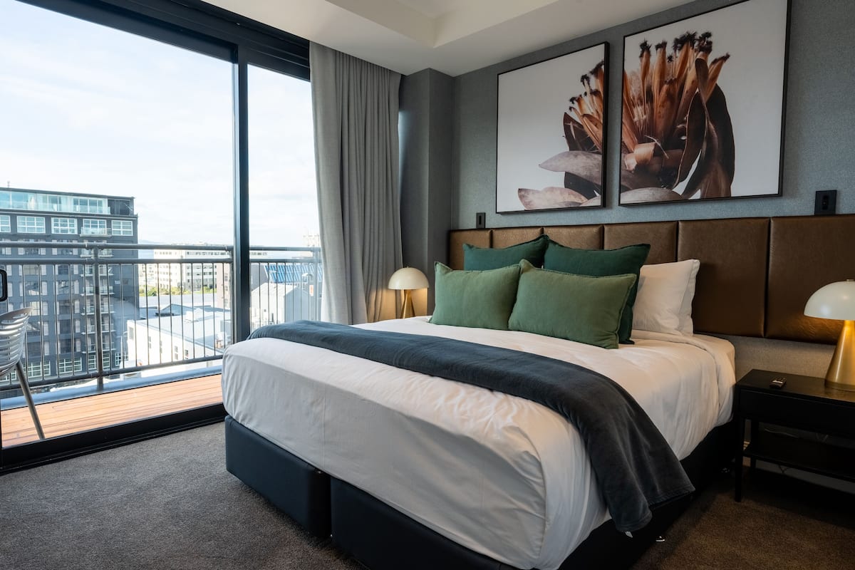 luxury penthouse, city view (4 king beds) | desk, laptop workspace, blackout curtains, soundproofing