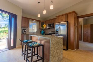 Fridge, cookware/dishes/utensils, dining tables