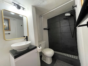 Shower, towels, soap, toilet paper