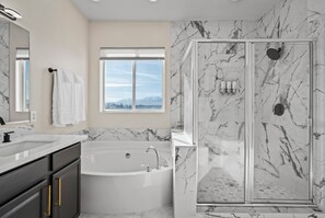 Bathtub, hair dryer, towels, soap