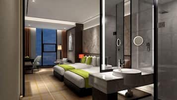 A modern hotel room with a large bed, a separate sitting area, a bathroom with a large mirror, and a view of the cityscape.