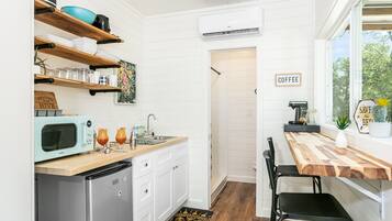 Fridge, microwave, coffee/tea maker, toaster