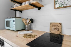 Fridge, microwave, coffee/tea maker, toaster