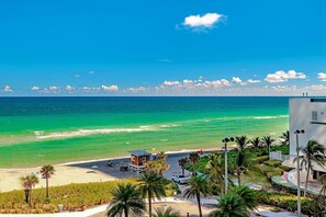 On the beach, sun loungers