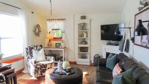 Smart TV, fireplace, DVD player, books