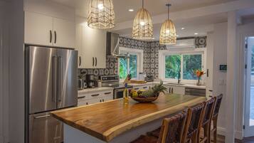 Villa | Private kitchen | Full-size fridge, microwave, eco-friendly cleaning products, freezer