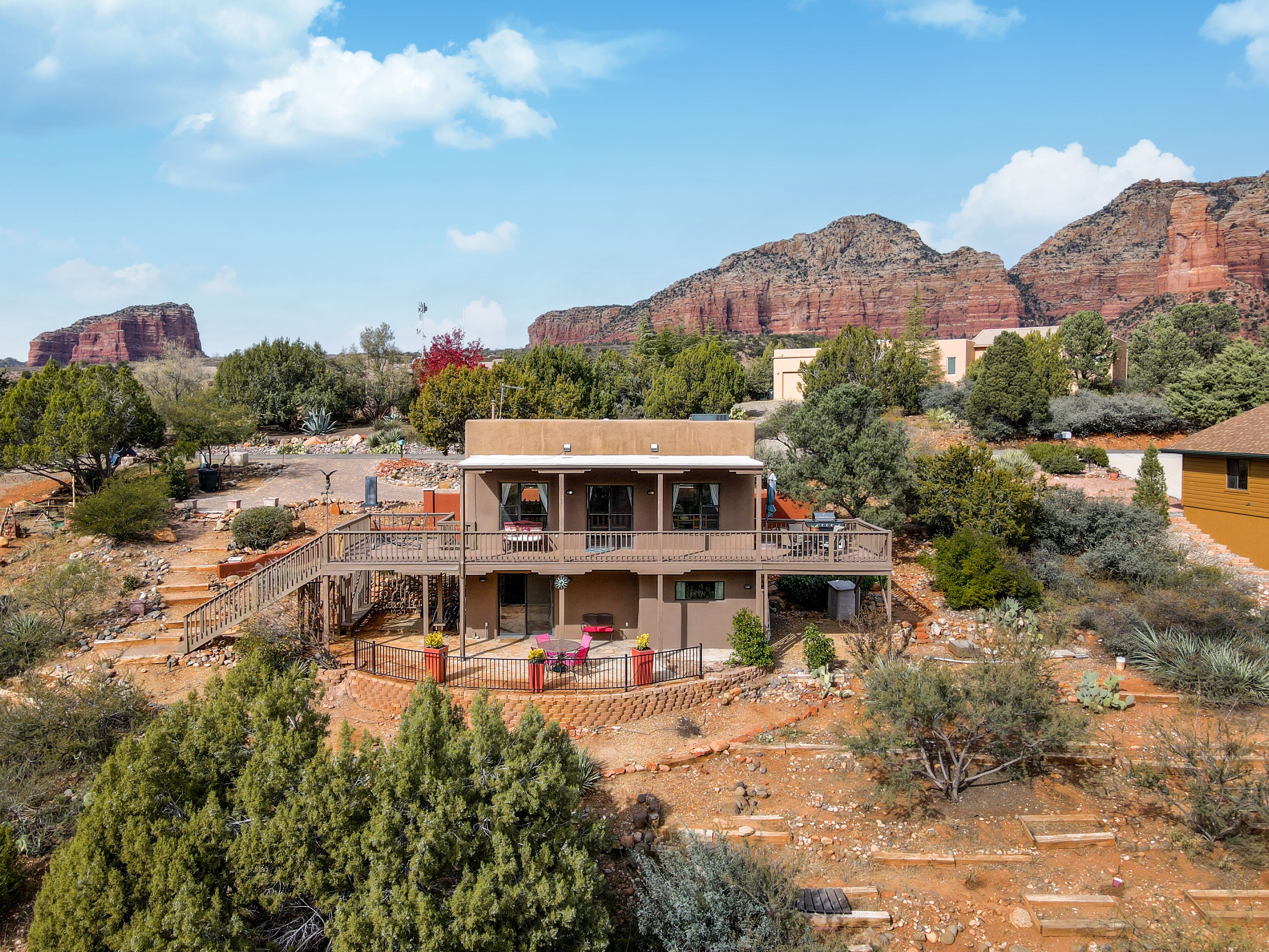 In the shadow of Sedona's stunning red rocks. That's "Courthouse" on the left.