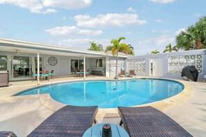 Outdoor pool, a heated pool - 4 Bedroom Pool Home - Walk to the Beach! (West Palm Beach)