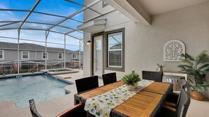 Outdoor dining - Championsgate Resort 5 Bedroom Private Pool Home (Davenport)