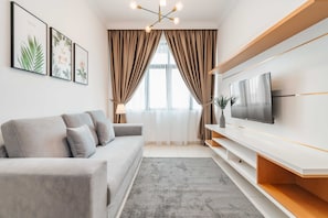 Design-Apartment, 3 Schlafzimmer, Stadtblick | Wohnbereich