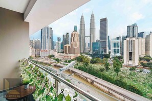 Deluxe Suite, 3 Bedrooms, City View | Living area - Legasi Kampung Bharu Guesthouse (Kuala Lumpur)