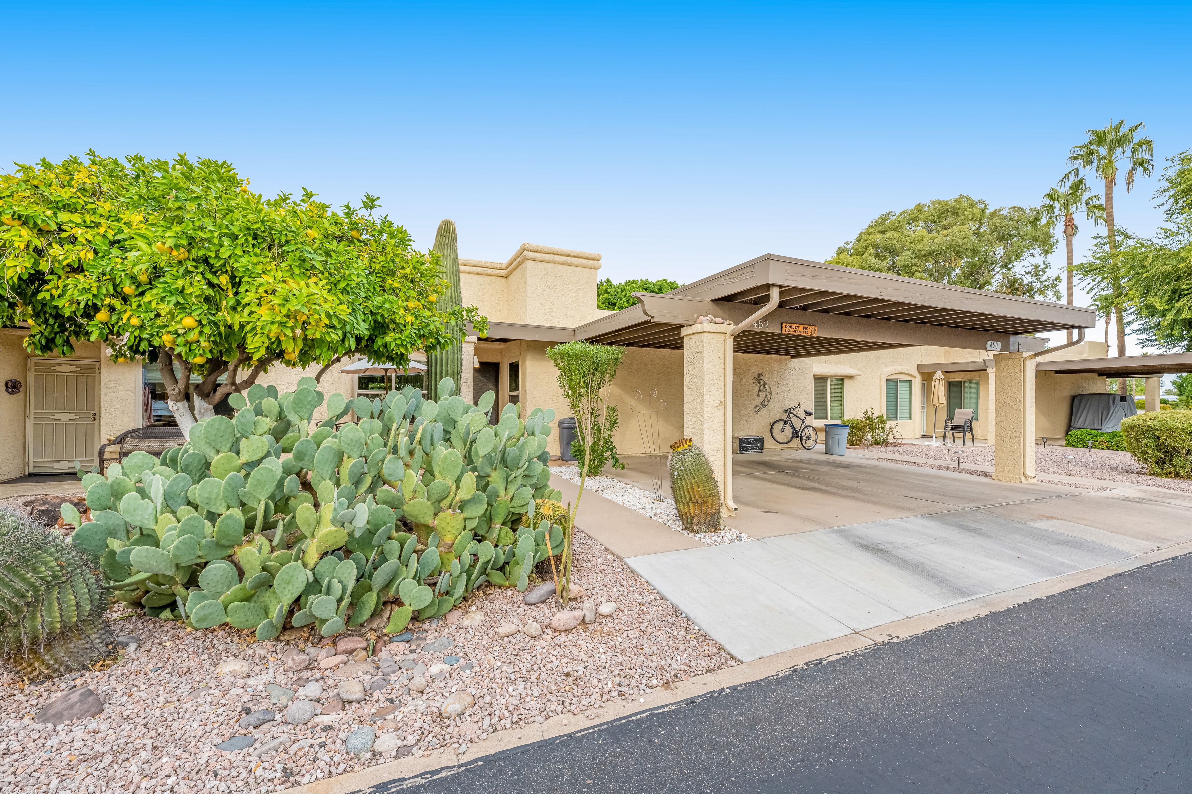 Ground-floor condo with fairway views, pool, hot tub, covered patio, & grill