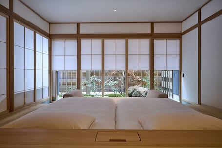 Twin Room, Non Smoking (Niwa) | Free minibar, in-room safe, iron/ironing board, travel crib
