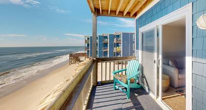 Updated beachfront condo with endless ocean views & covered balcony