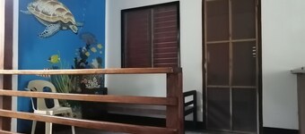 Room#1 with Terrace 5 min walk to the Beach and to the Town center.