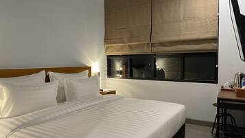 Roupas de cama premium, Wi-Fi de cortesia, roupa de cama