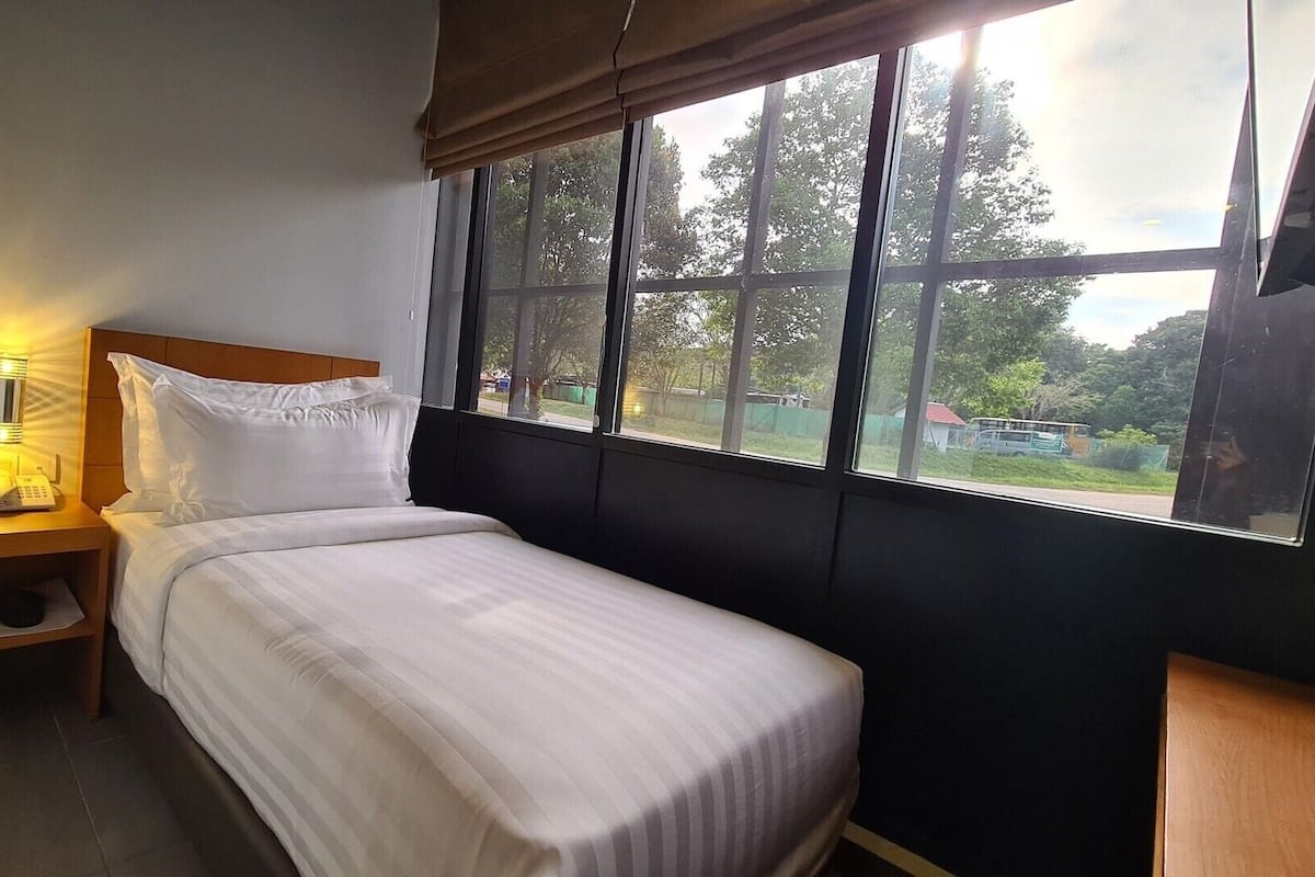 Roupas de cama premium, Wi-Fi de cortesia, roupa de cama
