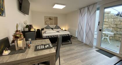 1,5 Zi-App. modern mit Küche +Terrasse nahe S-Bahn. 250 Mbit Internet