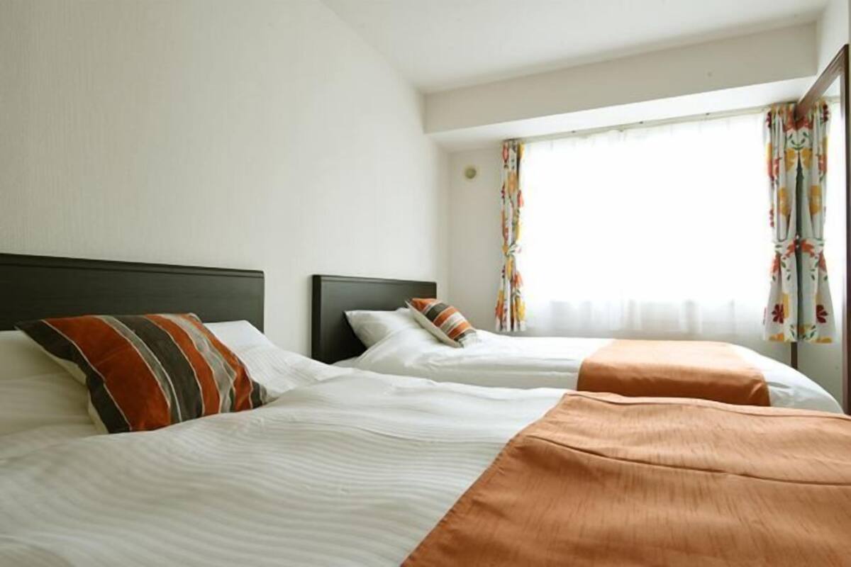 2 bedrooms, blackout drapes, iron/ironing board, WiFi (free)