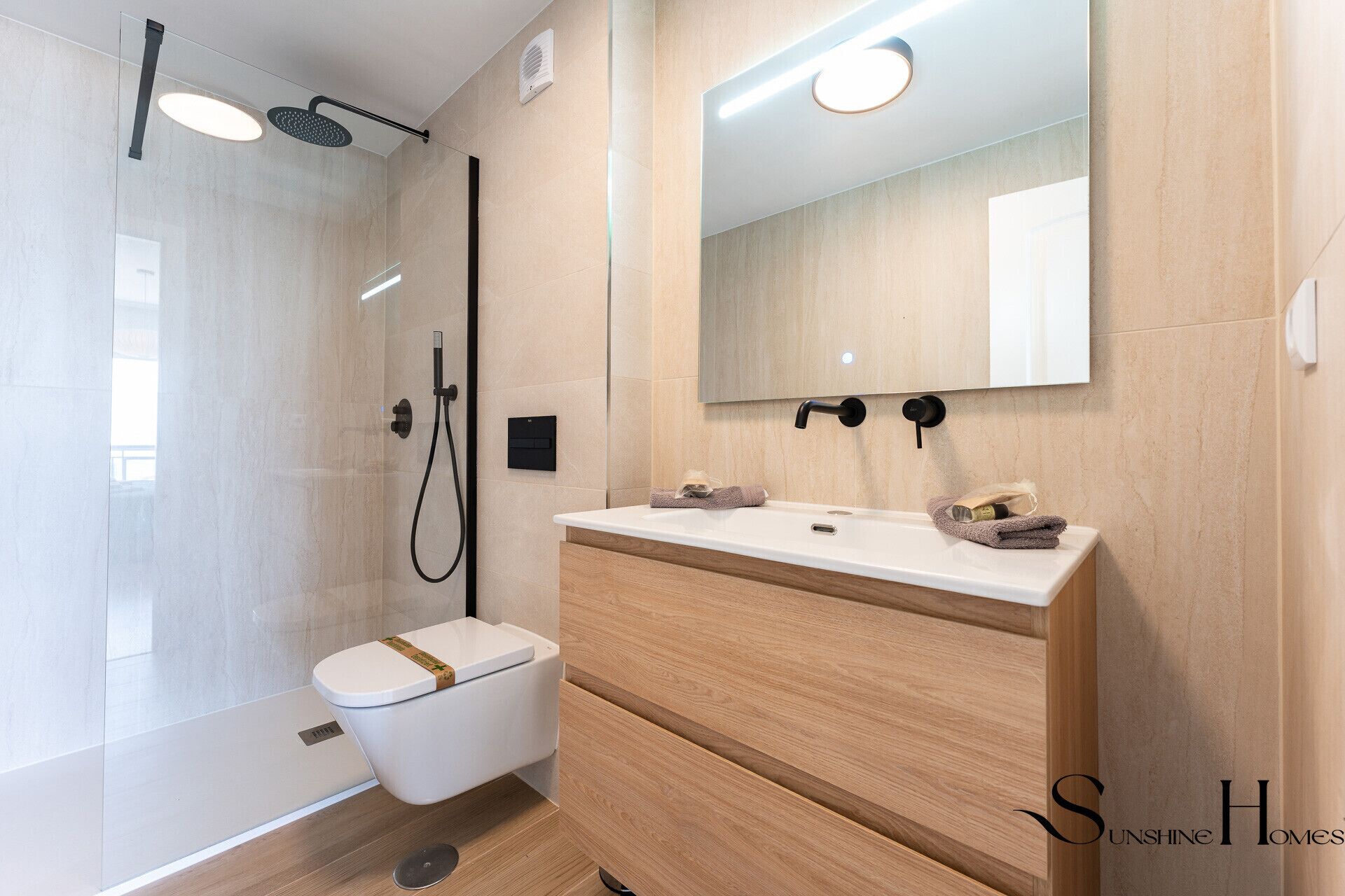 Bathtub, hair dryer, towels