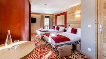 Habitación superior | Cunas gratuitas, wifi gratis y ropa de cama