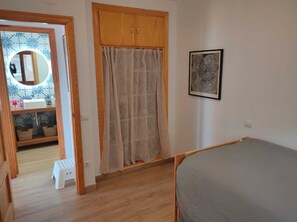 2 bedrooms, desk, iron/ironing board, travel crib