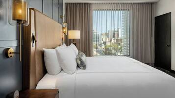 Suite, 1 Bedroom | In-room safe, laptop workspace, blackout drapes, WiFi (free)