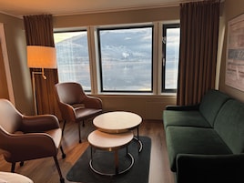 Superior Twin Room, Lake View | Living area | 34-inch LED TV with cable channels, TV