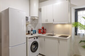 Fridge, microwave, coffee/tea maker, electric kettle